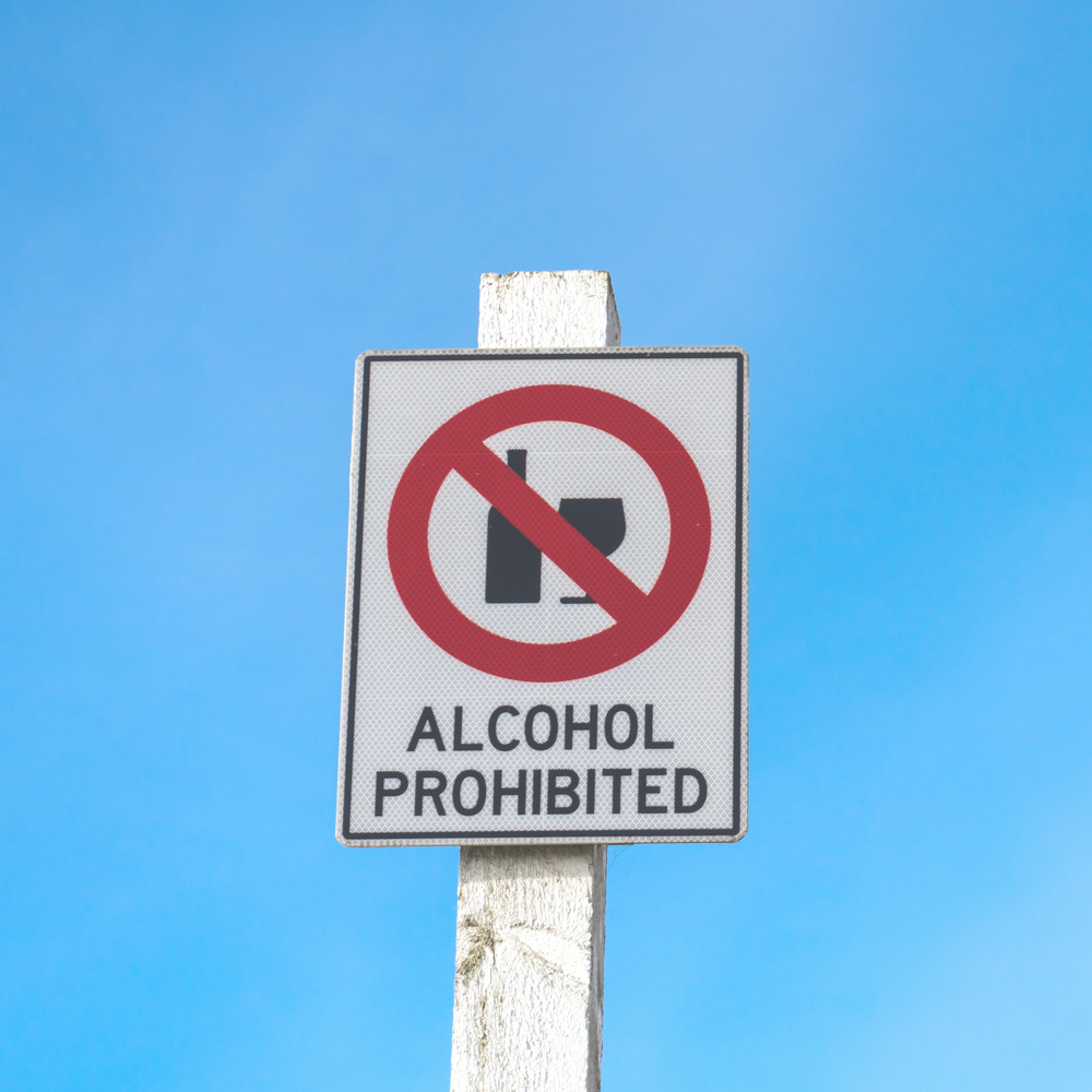 A sign that says "alcohol prohibited" to symbolize when was prohibition.