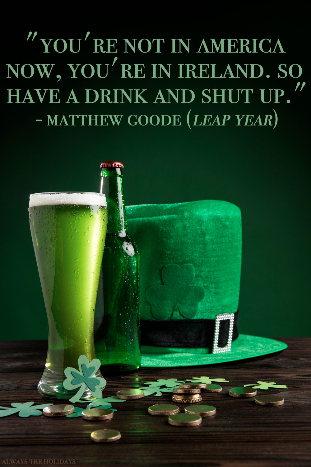Green beer and hat on a table with a lucky quote text overlay. A beer and shamrock hat on a table, with a lucky quotes text overlay from a movie.