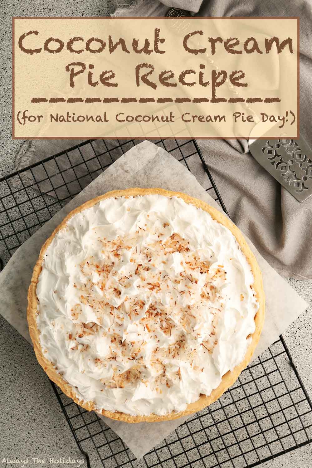 Coconut cream pie with text overlay. A coconut cream pie on a drying rack with parchment paper under it and a text overlay that says "coconut cream pie recipe for national coconut cream pie day".