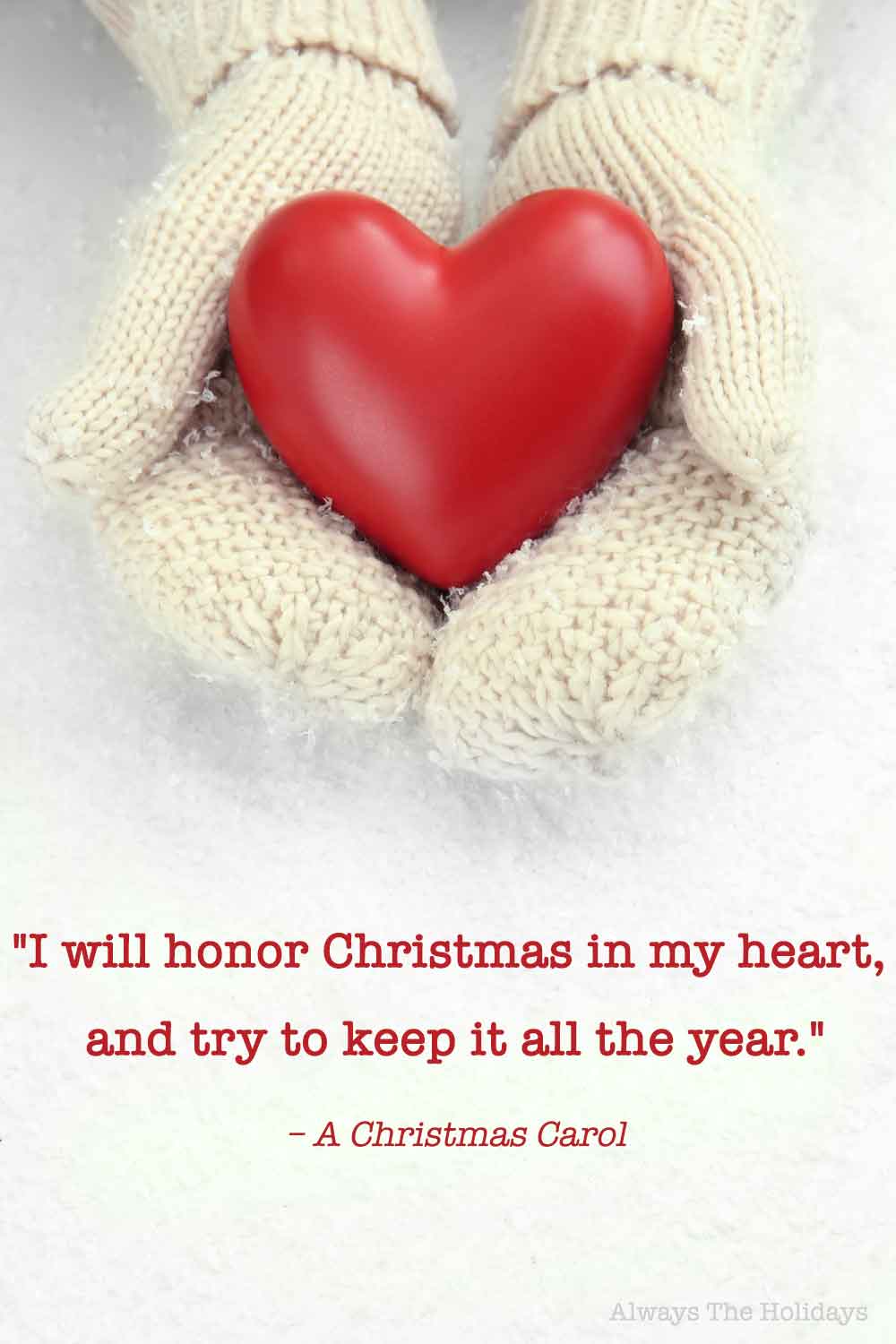 Hands wearing white mittens holding a red heart with a Christmas quotes from movies text overlay.