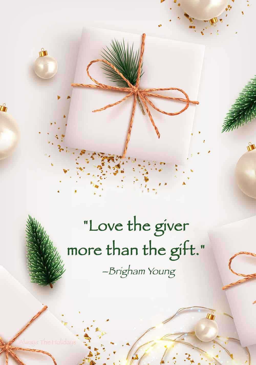 White presents with jute ties, white ornaments and tiny green trees on a white background with a Christmas love quote on it.