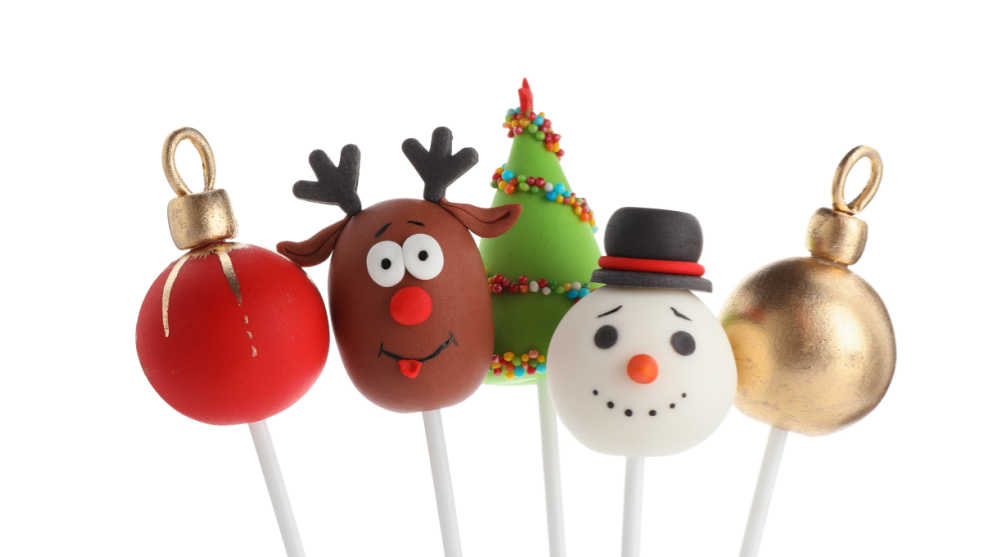 Ornament, reindeer, Christmas tree, and snowman cake pops.