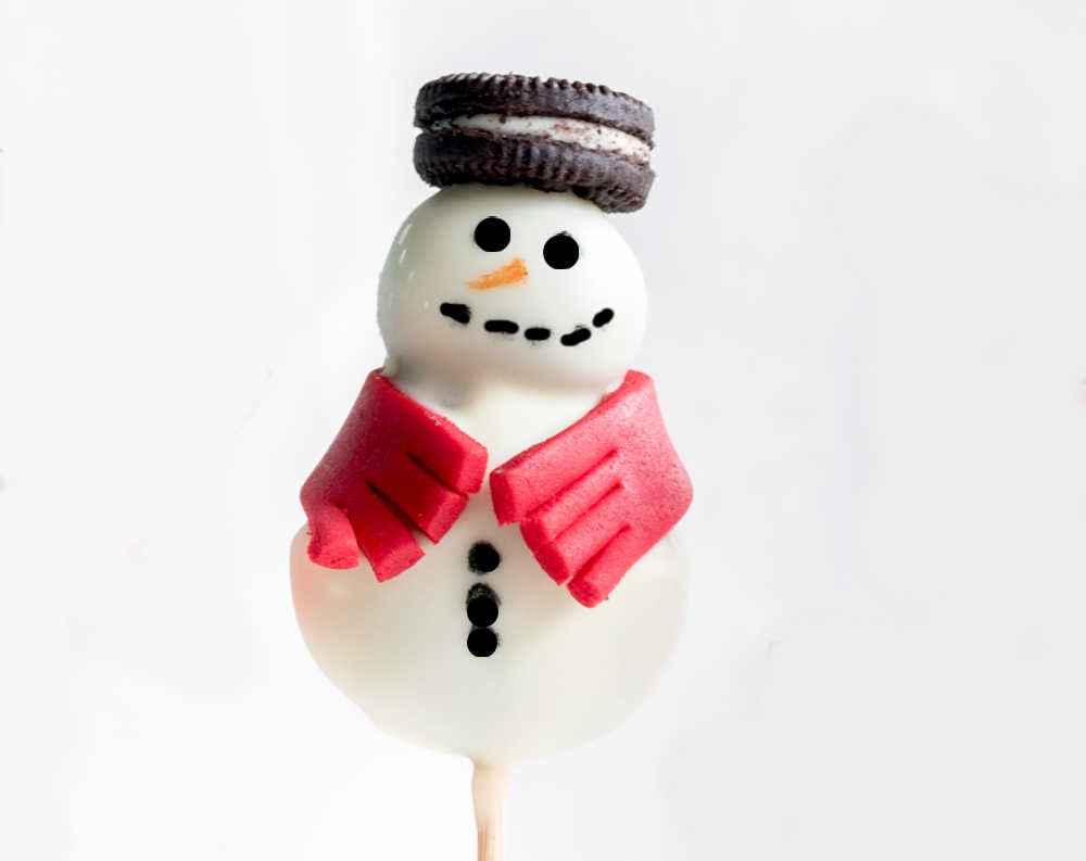Snowman cake pop with cookie hat.