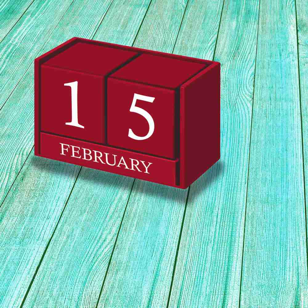 February 15 blocks Blocks that read Febuary 15 on an aqua wooden background to show the date of the Lupercalia festival.