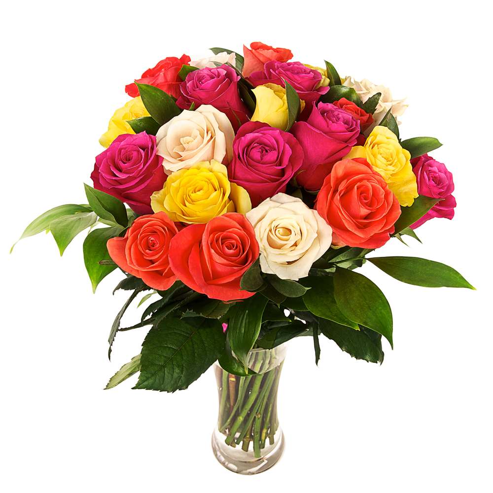 A bouquet of various rose colors in a glass vase against a white background.