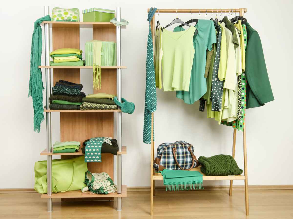 Green clothing A clothing rack and wooden bookshelf full of green clothing to advertise wearing green on St. Patrick's Day.
