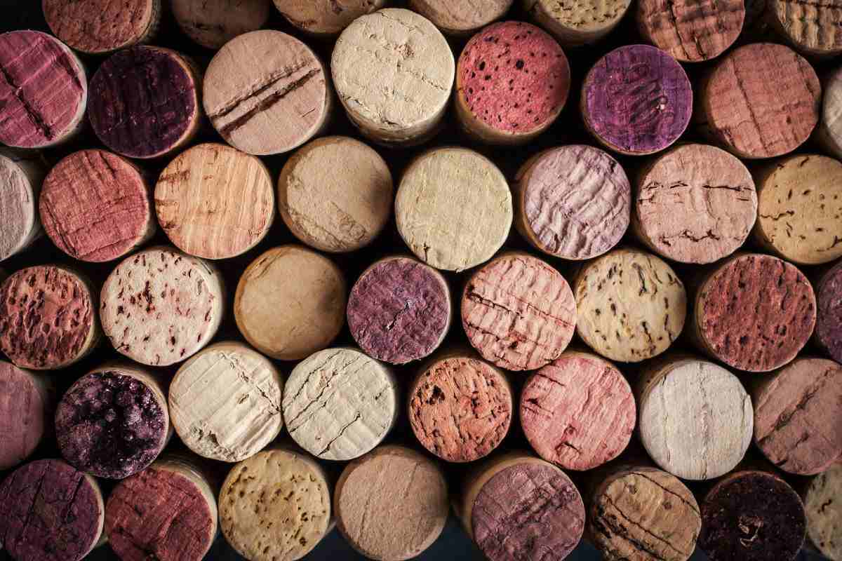 Wine corks An overhead shot of used wine corks of varying colors to make wine cork crafts.