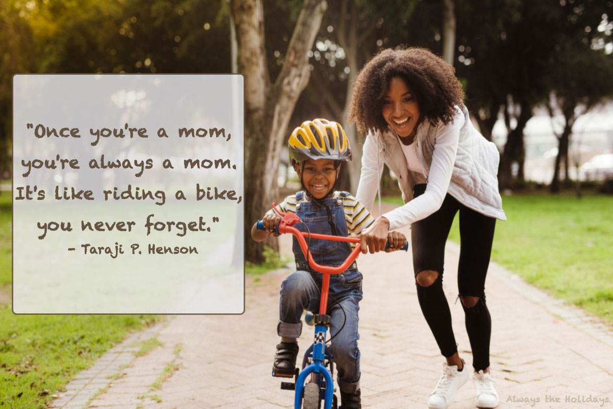 Boy riding a bike with mom and motherhood quote An inspirational mom quote beside a mother teaching her child how to ride a bike.