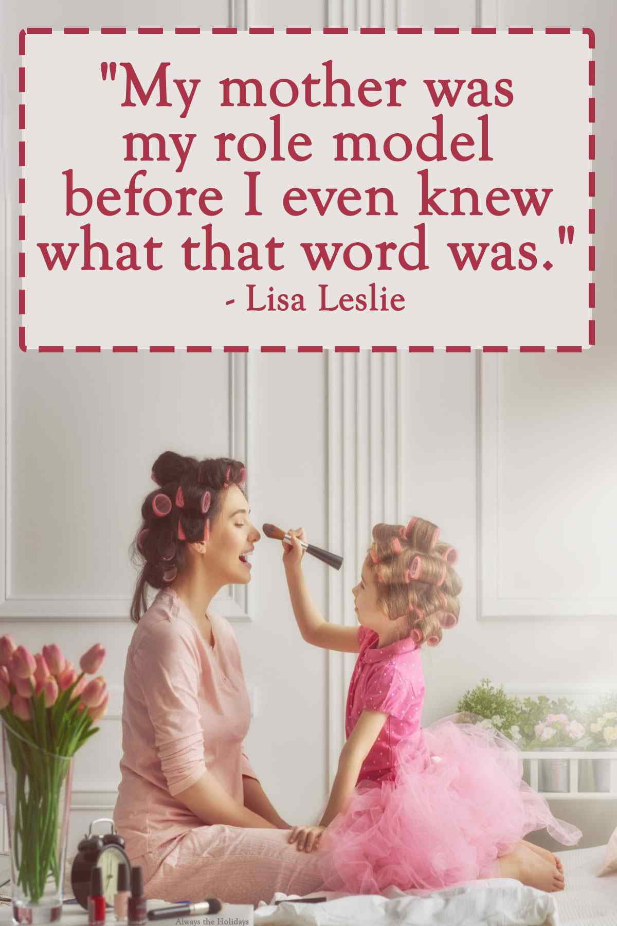 Mom and daughter putting on makeup with quote An inspiring quote for mothers text overlay on top of the image of a mother and daughter with curlers in her hair, and the little girl is putting makeup on mom.