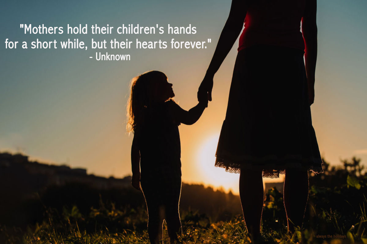 Mother and child silhouette with mum quote A quotes for mum text overlay on the image of the silhouette of a mother holding her child's hand on a mountain watching the sunset.