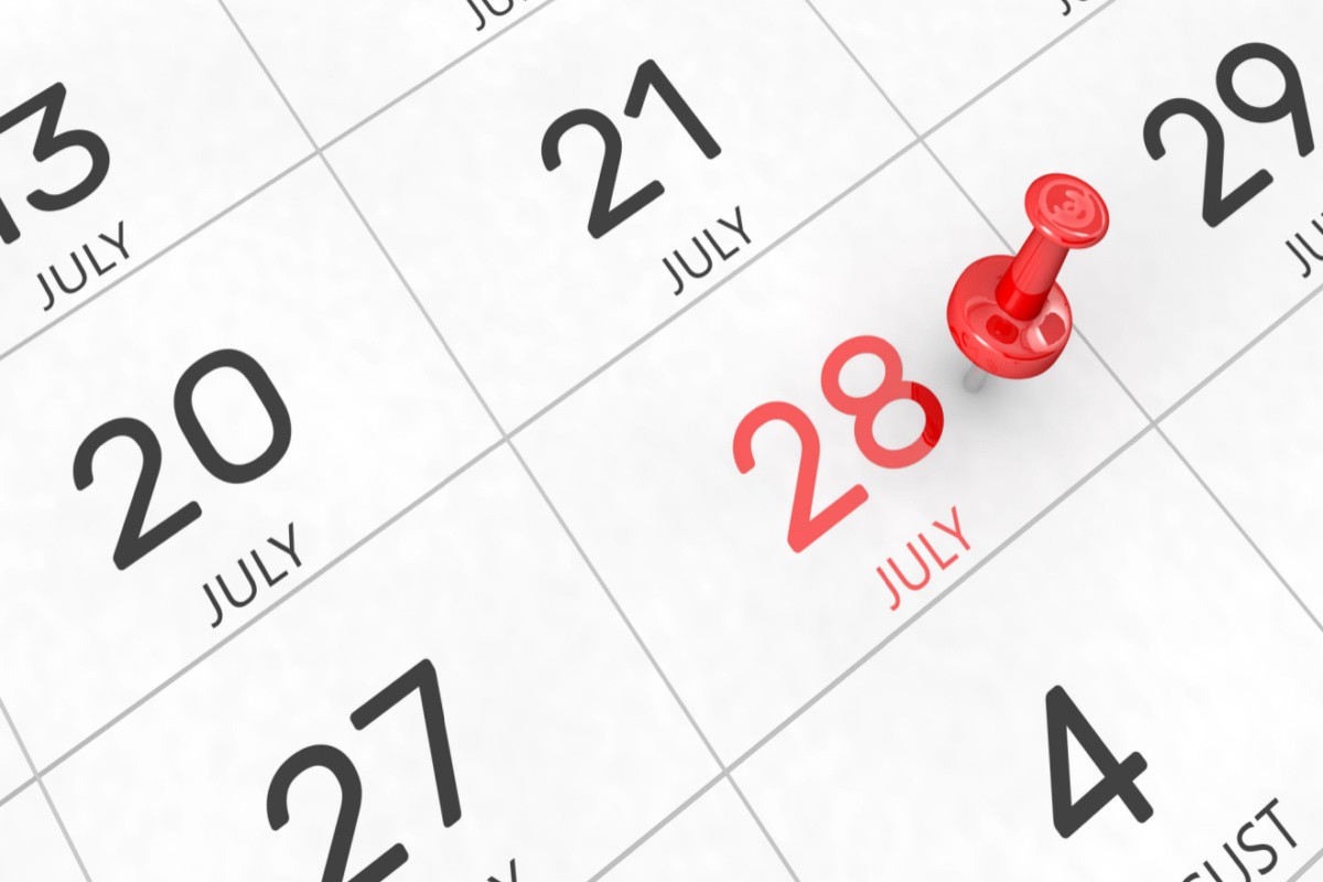 July 28 on a calendar in red A calendar of July with the day 28 in red with a red push pin on it to highlight the significance of July 28 national days.