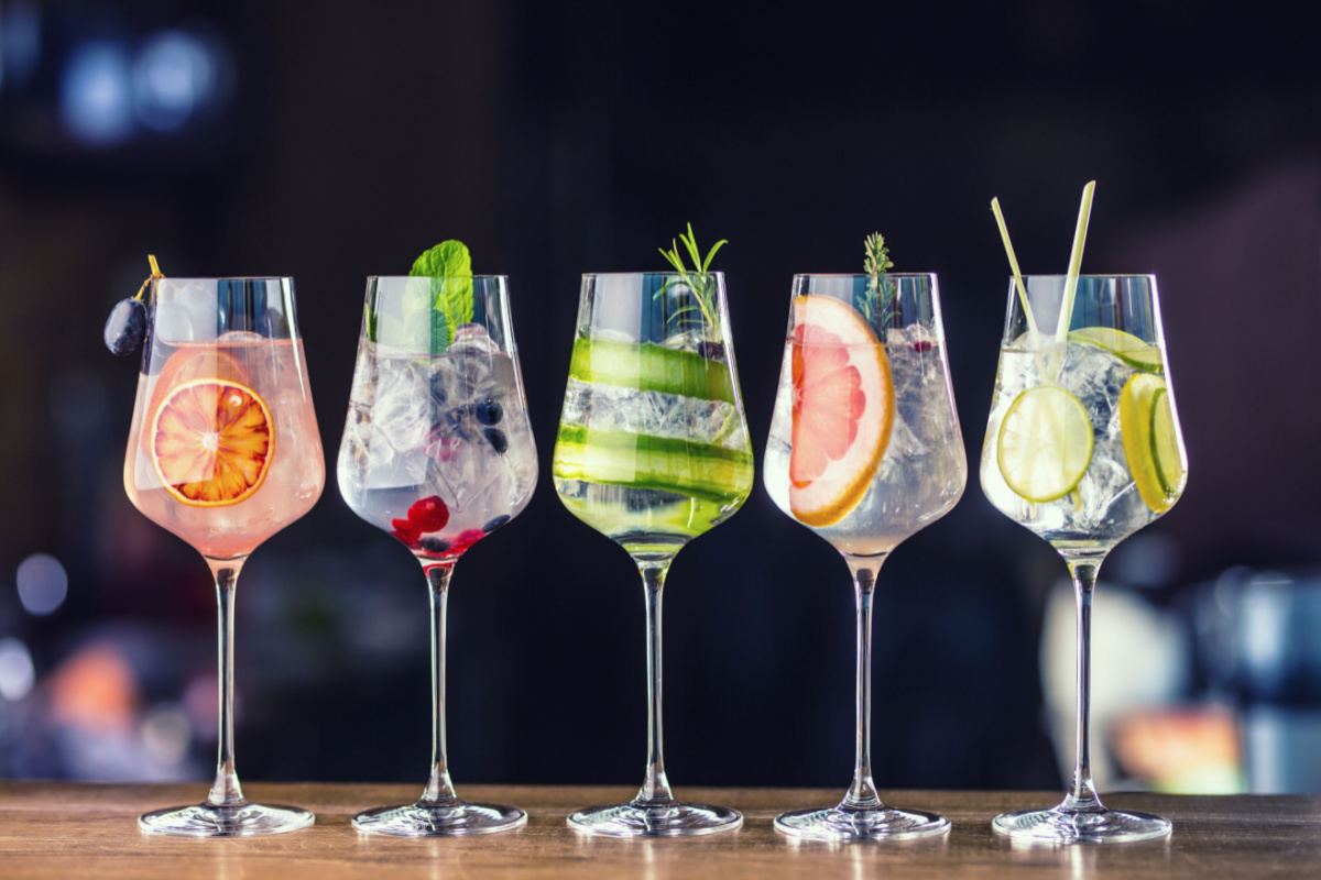 Five cocktails Five different fancy cocktails with fruit garnished to celebrate the national drink days of the year like National Mojito Day.