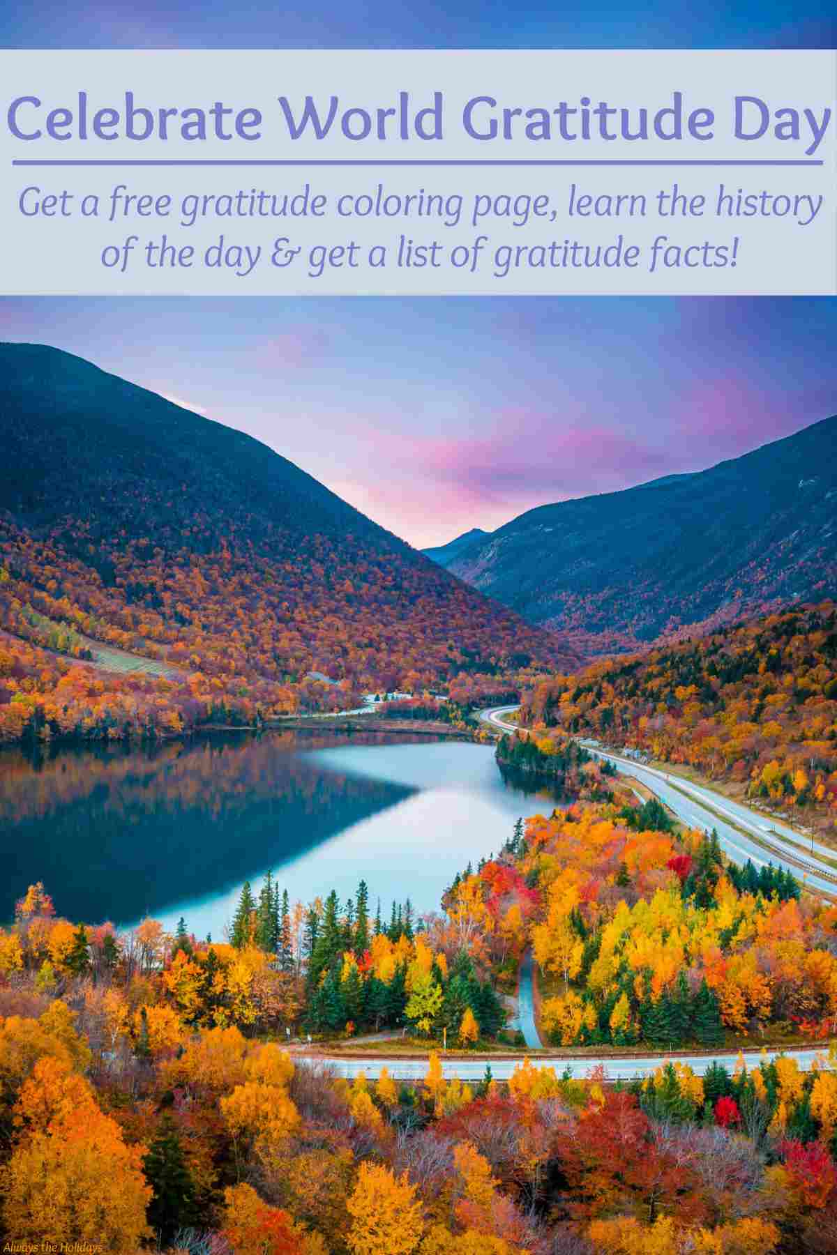 Find Out About World Gratitude Day Text that reads "celebrate World Gratitude Day - get a free gratitude coloring page, learn the history of the day and get a list of gratitude facts!" over an image of a fall sunset where the sky is shades of blue and purple, with trees changing colors from yellow to red, in front of two mountains and a lake with a paved road running along he side of the image.