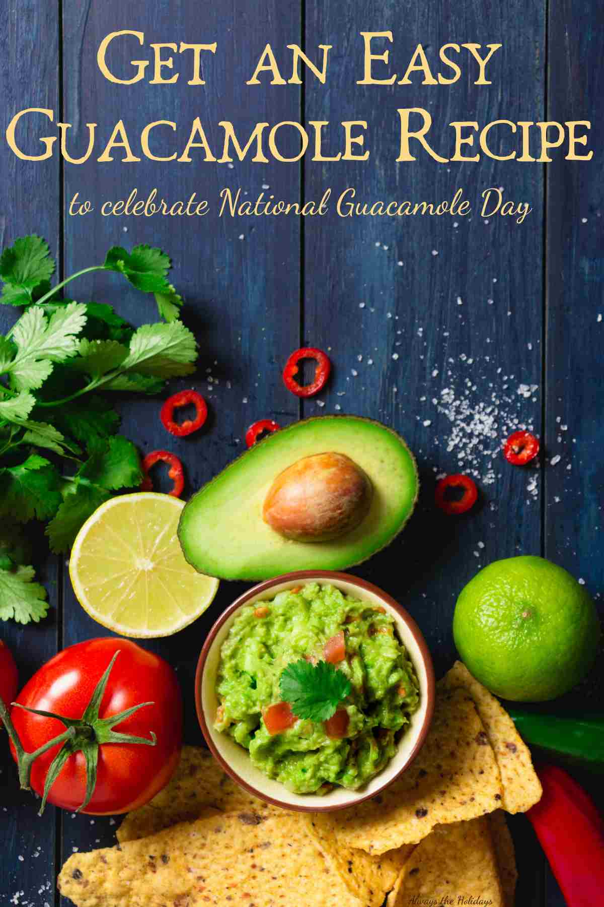 Celebrate National Guacamole Day with an easy guacamole recipe! #GuacamoleRecipe #NationalGuacamoleDay A bowl of guacamole with guacamole ingredients around it including avocados, lime, tomato, cilantro, serrano pepper, lemon and salt and a text overlay above it that reads "Get an easy guacamole recipe to celebrate National Guacamole Day".