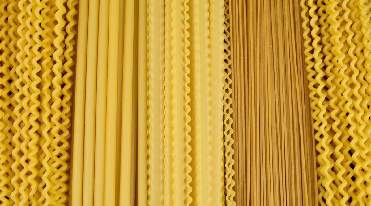 Long pasta types A rectangular image completely filled with various long pasta types.