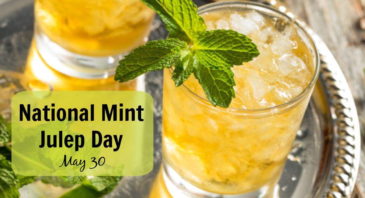 Two mint juleps in glasses with a text overlay Two mint juleps in clear glasses with a neon green box at the bottom of the image with black text over it that reads National Mint Julep Day May 30.